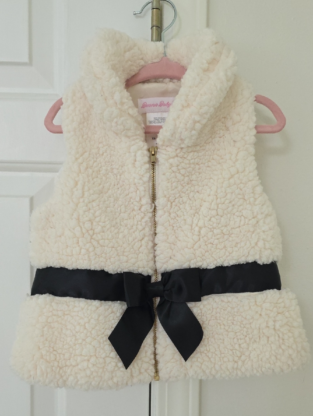 Bonnie Baby Cream Sherpa Vest with Pink Trim and Black Bow